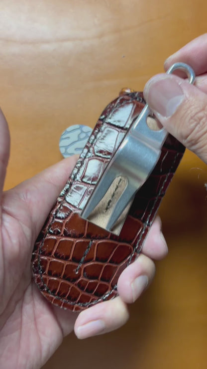 Scotty Cameron Pivot Tool & Golf Tee Holder. Pocket for 1.5 inch Ball Marker. Embossed Crocodile and Natural Veg Tan leather.